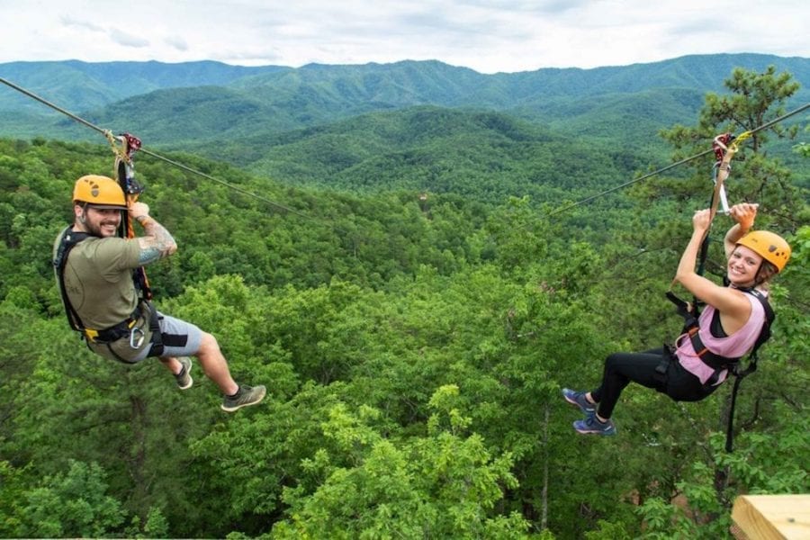 What To Expect On Our Mountaintop Zipline Tour In The Smoky Mountains   Two Friends Enjoying The Mountaintop Ziplines In The Smoky Mountains 900x600 