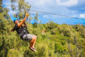 happy girl ziplining on oahu